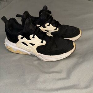 Kids/Women’s Black and White Athletic Shoes